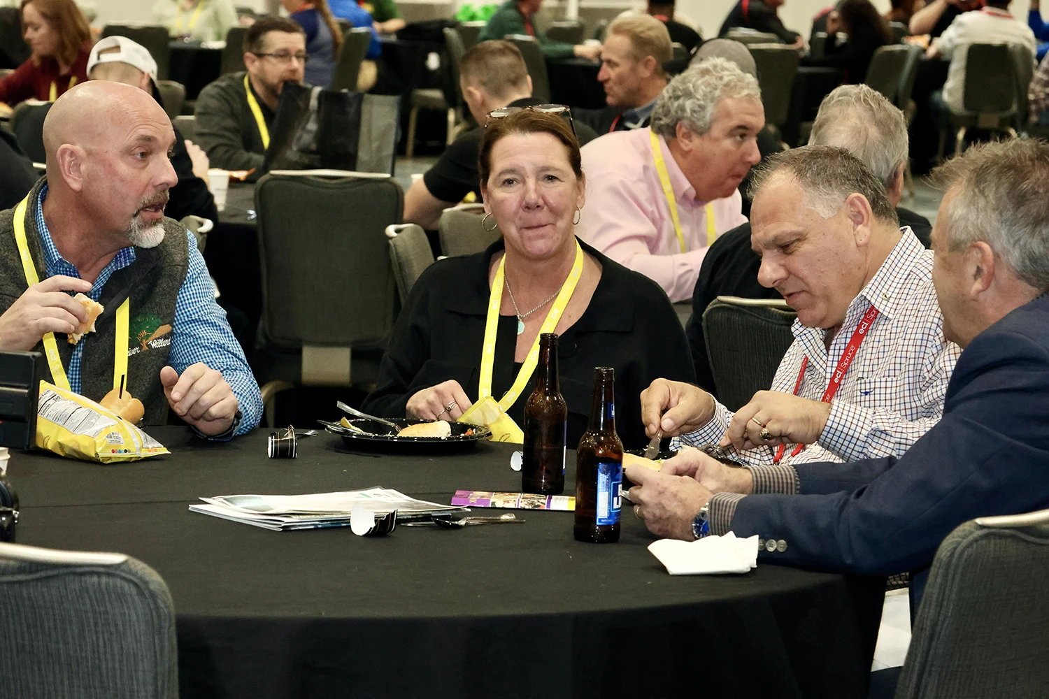 People eating lunch on show floor