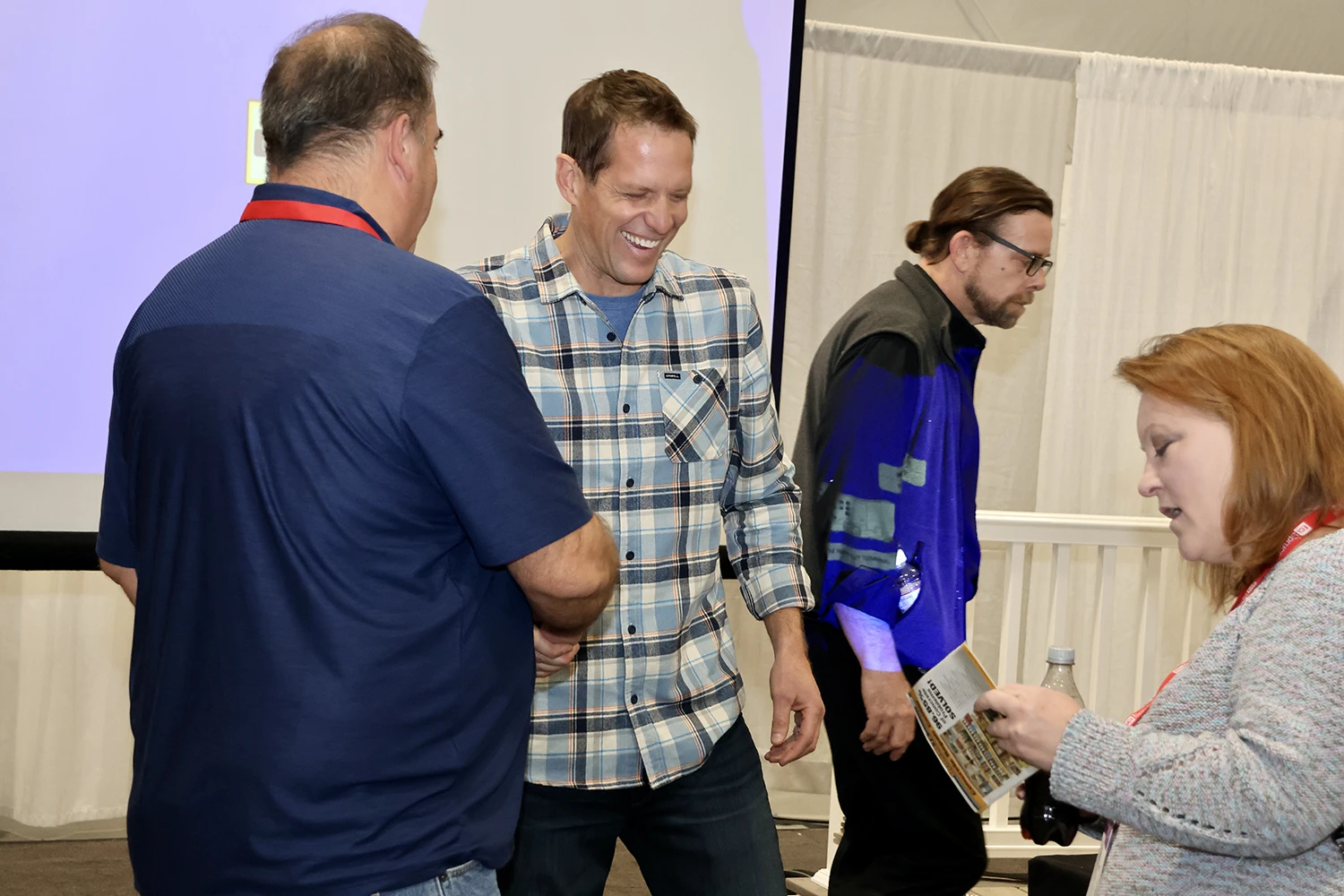 Chris Lambton smiling with attendees